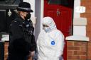 Forensic officers at the scene in Moore Street, Kingsley, Northampton (Jacob King/PA)