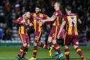 Paul Taylor is congratulated by his City team-mates after scoring just before half-time – Picture: Thomas Gadd