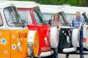 Tracey and John Richardson with their fleet of campervans for hire.