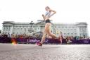 Chris Booth's shot of the day: Johanna Jackson from New Marske passing Buckingham Palace. Unfortunately she was disqualified from the event , which was won by Russia's Elena Lashmanova