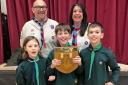Pictured are Assistant District Commissioners - Colin Smith and Maz Jennings, with Cubs - Frank Bussey, Harry Place and Jonny Walters