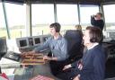 Air traffic controllers keep a close eye on all flights