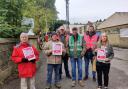 Striking postal workers are joined by local residents in an act of solidarity, on the picket line at Ilkley Distribution Office on Friday, September 30
