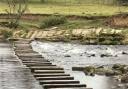 Stepping stones over the River Wharfe in Burley-in-Wharfedale - the location where Burley Bridge Association want to build a bridge
