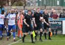 Guiseley players enter the field against Liversedge