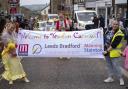 Yeadon Carnival Committee Co-Chair Jo Kenyon and Committee Member Sam White lead the parade from Yeadon Town Hall