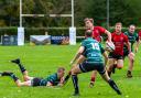 Action from Ilkley's (red) fixture with York on Saturday. Photo credit: Peter W. Clark