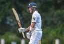 Yorkshire wicket-keeper Andrew Hodd, who made 79, acknowledges the crowd's applause on reaching 50 for New Farnley Picture: Ray Spencer