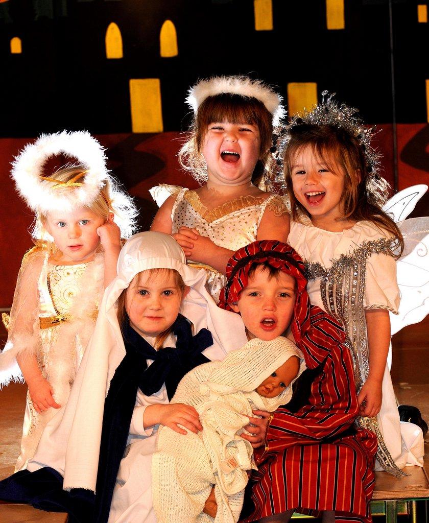 Ghyll Royd School Nursery, Burley-in-Wharfedale: Lottie Johnson, three, and Jacob Wells, four, as Mary and Joseph, with angels Lilly Rose-Emmott, two, Katie Fox, four, and Ava Jones, three.