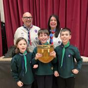 Pictured are Assistant District Commissioners - Colin Smith and Maz Jennings, with Cubs - Frank Bussey, Harry Place and Jonny Walters