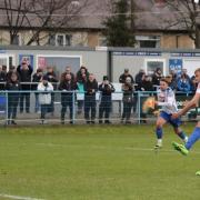 Guiseley AFC winger Lewis Whitham taking a penalty for his side in February of this year (Image: Alex Daniel)