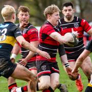 Action from Ilkley (red and black) V Kendal Photo credit: Peter W. Clark