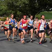 The Burnsall Classic Fell Race leaders set the early pace. Photo credit: Dave Woodhead