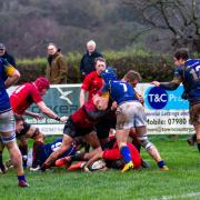 Action from Ilkley (red) against Alnwick