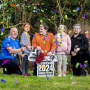 Celebrating Ilkley Carnival’s Mardi Gras theme announcement are L-R carnival committee member Colin Watson with AWARE members Aoife West, George McKerchar, Willow Baker and AWARE volunteer Ross Hall