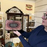 Kitty Ross, Leeds Museums and Galleries' curator of social history with items from the exhibition