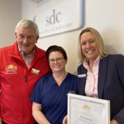 L-R Mike Davies, MBE, Lead Dental Nurse Leza Athey and Practice Manager Caroline Smith
