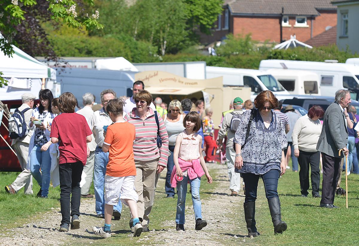 Visitors enjoy the sunshine and exhibits at Otley Show 2014