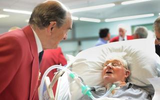Gordon Sugden in conversation with one of his fellow Steeton Male Voice Choir members during the special concert at the Northern General Hospital in Sheffield, where he is being treated after a tragic car accident left him paralysed