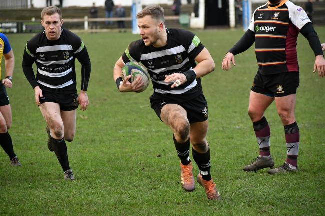 Otley RUFC's National League Two status is still up in the air after the RFU took the decision to end the season because of the Coronavirus outbreak. This picture shows Otley's Owen Dudman scoring a try against Caldy. Picture: Richard Leach