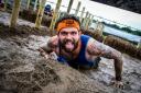 Getting down and dirty at Tough Mudder, Broughton, in 2019. Picture Tough Mudder
