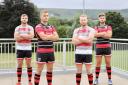Ilkley's new home (red) and away (white) kits featured on their 1st XV players