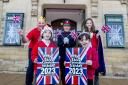 All Saints Primary School pupils Alex Aperghis (left) and Rosalind Brown join Deputy Lieutenant for West Yorkshire Suzanne Watson and Ilkley Carnival committee member Colin Watson to launch the Carnival’s “The Coronation” theme from