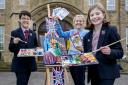 Pupils Ellie Stitson and Kirk Dillon from Ilkley Carnival’s creative competition sponsor Bradford Grammar School, help to launch the creative competition with head of art Sarah Horsfield