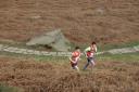 Ben Rothery and Jack Cummings battling it out at the Ilkley Moor fell race. Photo credit: Steve Davey