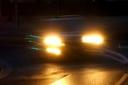 File photograph of a car's headlights