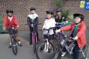 Five of children having just tried out their new bikes and helmets from Otley Town Council