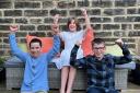 Isaac Taj, Charlotte Brown, and Sebastian Collins, former pupils of Westville House School, Ilkley, celebrate passing their GCSE maths exam