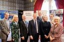 MP Robbie Moore with representatives of local businesses at the showcase event