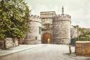 Skipton Castle's gateway depicted on a postcard