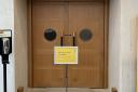 A sign in front of the doors to the treasures galleries at the British Library after the incident (Samuel Montgomery/PA)