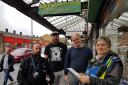 A 3GS officer and a Bradford Council warden in Cavendish Street, Keighley, with Graham Benn, second from right, and fellow trader Adam Marshall