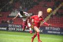 City substitute Tyrell Robinson heads their equaliser at Charlton – Picture: Stephen Wright