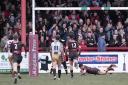 Colton Roche scores a try for the Bulls in front of their fans during last season's Joe Phillips Memorial Trophy clash, when drivers among the crowd of 2,131 found it difficult to find legal places to park – Picture: Charlie Perry