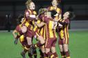 MOBBED: City's players celebrate Abi Lee's goal Picture: Alex Daniel Photography