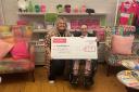 Rebecca Haestier hands over a cheque to Candlelighters