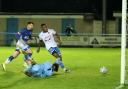 Jonathan Wafula slots home Guiseley's second in the FA Cup win over Matlock Town last night Picture: Alex Daniel