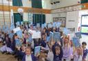 Pupils at Newlaithes Primary School, Horsforth with their dictionaries