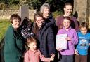 Members of St John's Church, Menston with the certificate confirming the  Eco Church Silver award