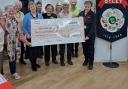 Otley Townswomen's Guild present a cheque to Yorkshire Air Ambulance