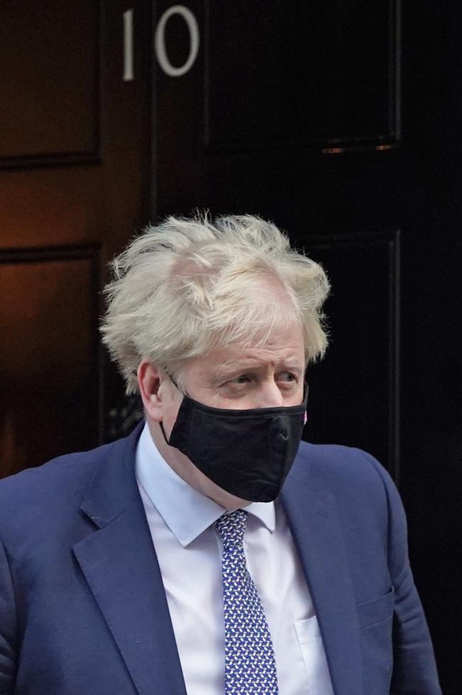 Prime Minister Boris Johnson leaving 10 Downing Street to attend Prime Minister's Questions at the Houses of Parliament on Wednesday