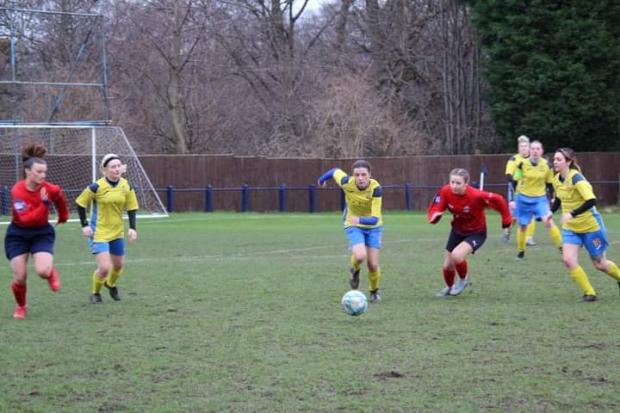 Silsden (yellow) in action at Yorkshire Amateur (courtesy Silsden Ladies).