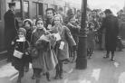 Jewish children alighting from the Kindertransport