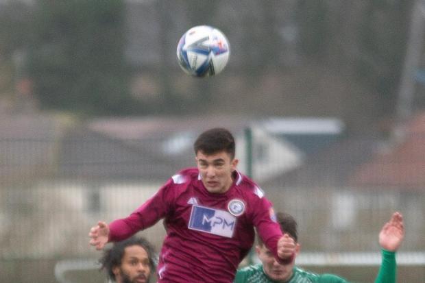 Kevin Gonzalez (red) scored a brace for Ilkley Town to secure their Step Six status