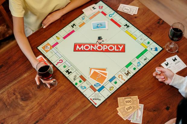 Ilkley Gazette: Two people playing Monopoly (Canva)