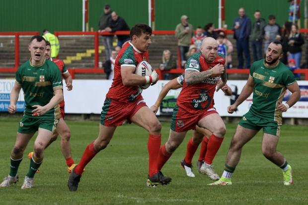 James Feather (ball in hand) was in top form during the win over London Skolars on Sunday. Picture: Jonny Tomes-Green.